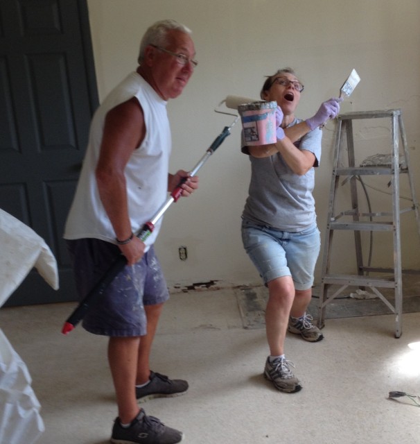 Larry and Nancy have fun painting the kitchen