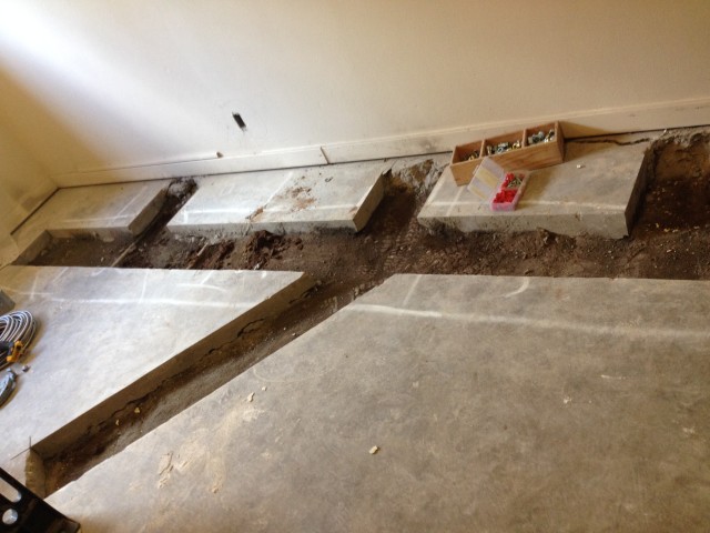 Here is the floor for the shower room, ready for the plumbers to add the new pipes.