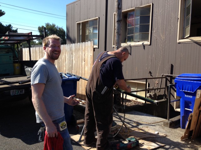Grant led the team. He's overseeing the guy fitting the pipes. It's a hot job on a hot day!
