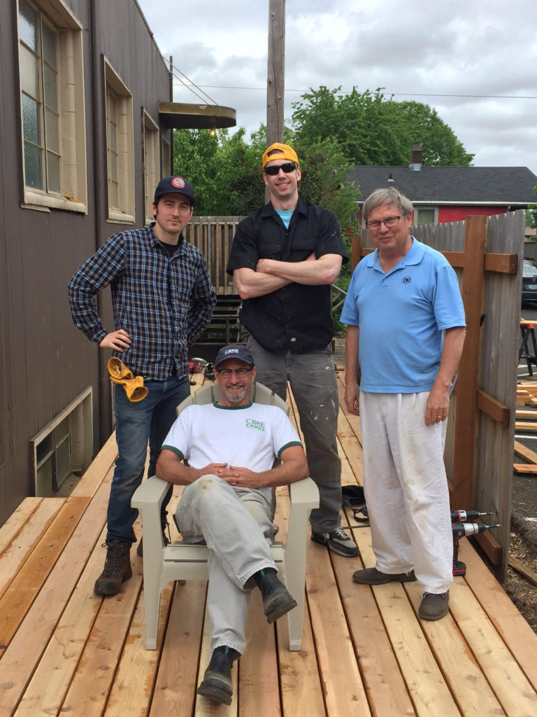 Volunteer deck building crew